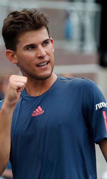 The Latest: Serena sets Grand Slam milestone: 307 wins